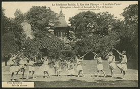 Postcard depicting children's musical activity at La Residence Sociale. (The Legacy Center Archives and Special Collections)